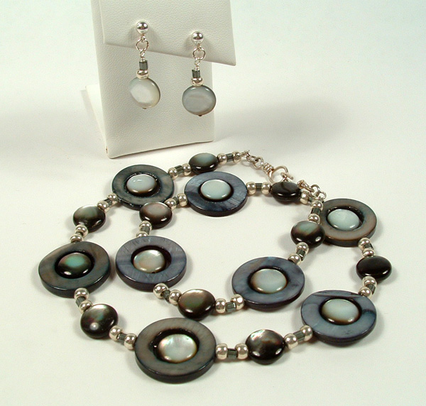 Black shell UFO necklace.