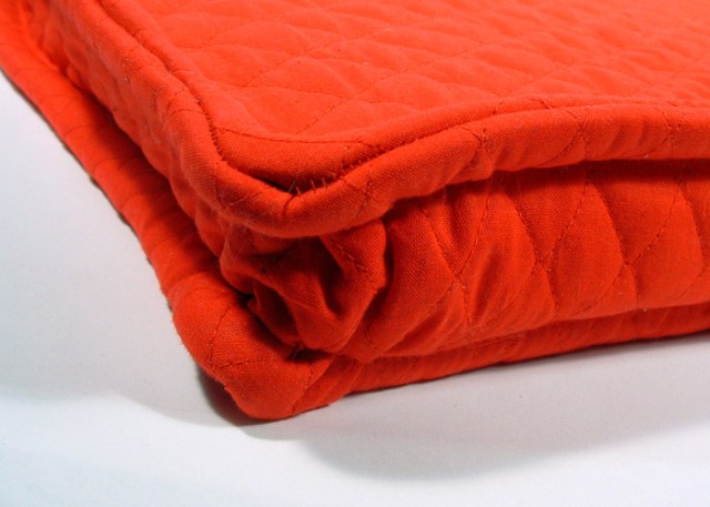 Photo of bottom of bad and imitation piping.