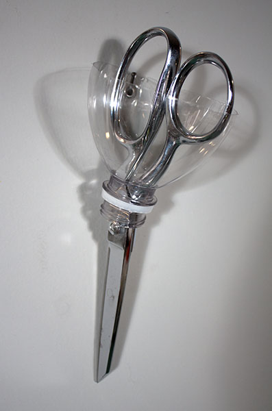Plastic bottle scissor holder
