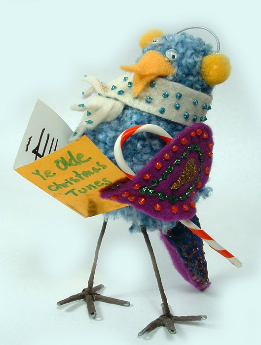 Photo of bluebird singing carols.