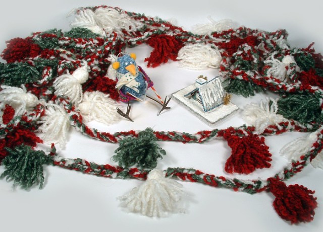 Photo of yarn garland, Choir Bird and winter A-Frame house.