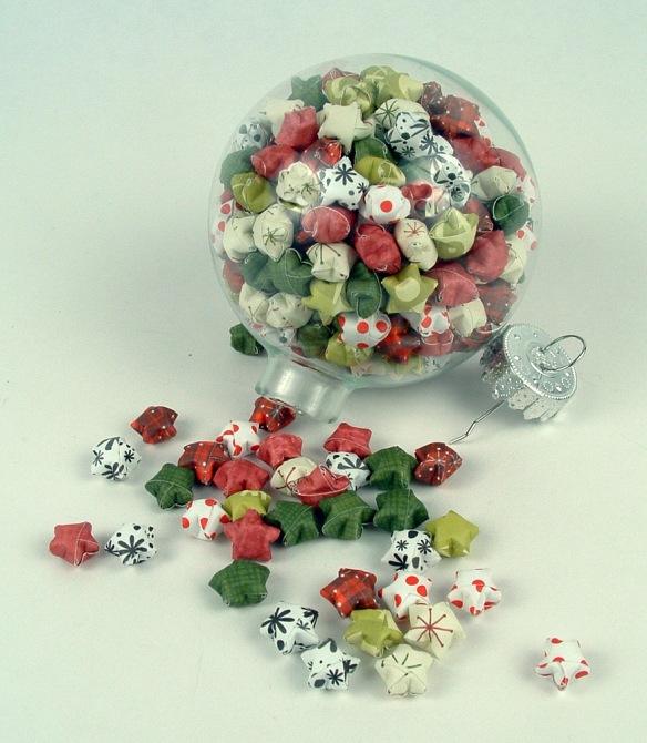 Glass ball full of origami lucky stars.