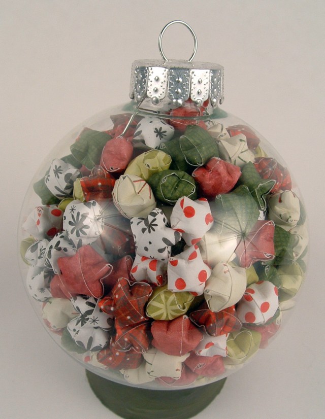 Glass ornament full of lucky stars.