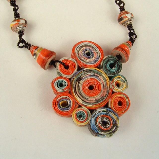 Rolled paper pendant made from Matisse paper.