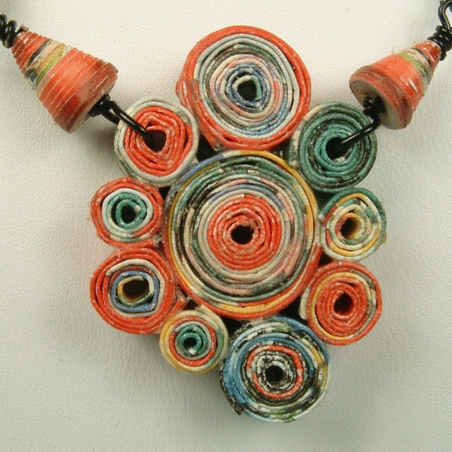 Rolled paper pendant.