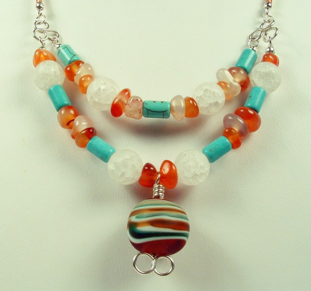 Close up view of the double strands of the front portion of the necklace.