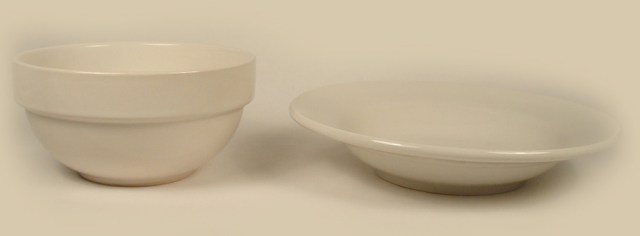 Photo of 2 different round diner bowls seen from a side view.