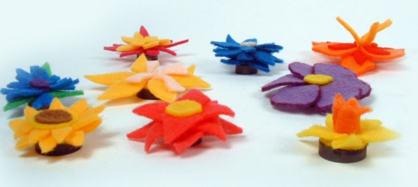 Side view of felt flower magnets.
