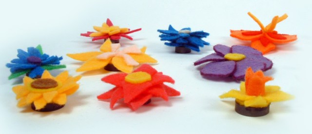 Side view of felt flower magnets.