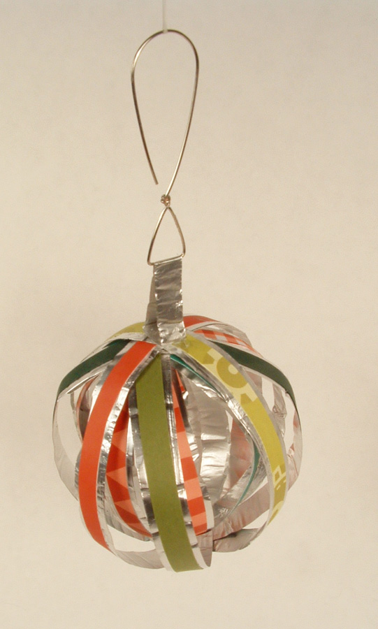 Ball ornament made of strips of paper and aluminum foil.