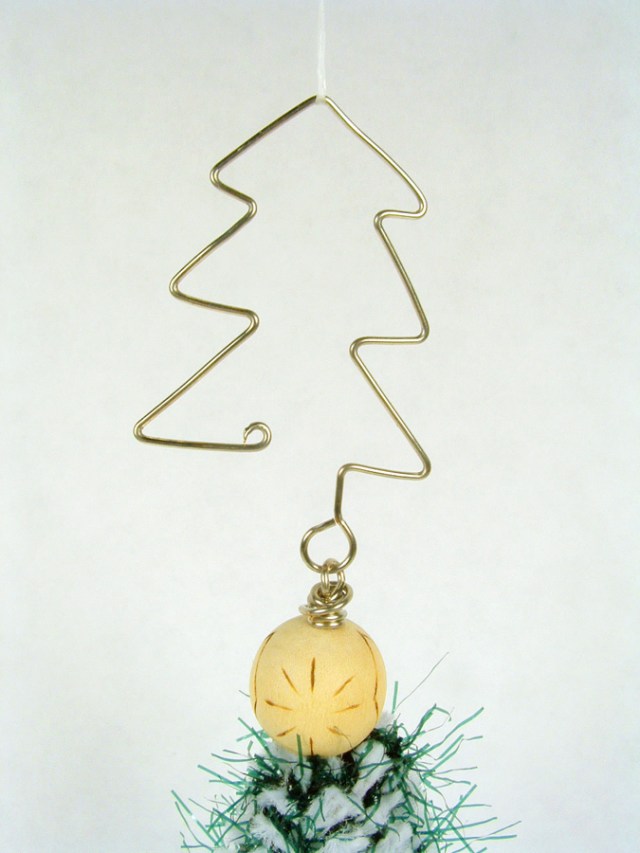 Ornament hook made to look like a Christmas tree.