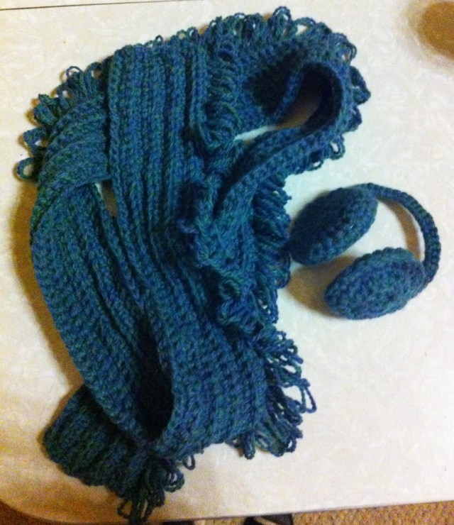 Matching set of earmuffs and scarf.