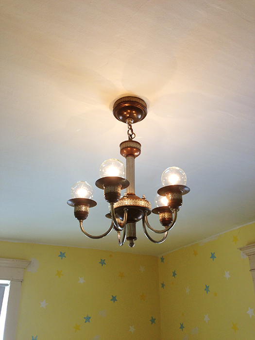 vintage light fixture with round bulbs
