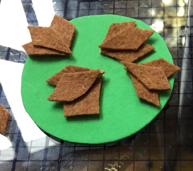 felt pieces cut and pasted for top layer of scales
