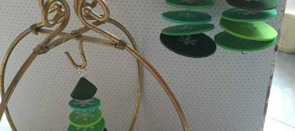 Three green foam tree ornaments.