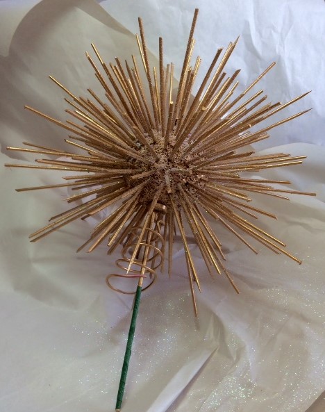 Star spray painted gold and re-glittered.