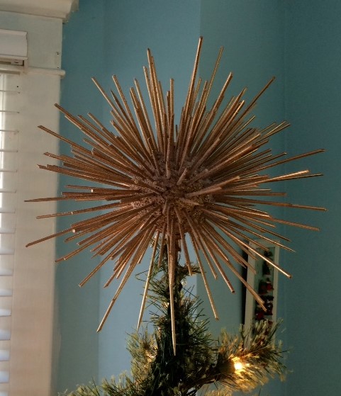 Gold spiky star on our tree!