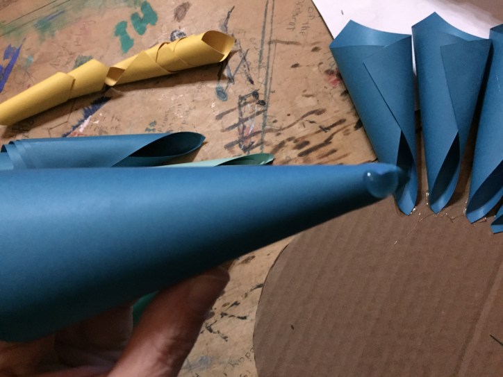 put glue on very tip of the back side of the cone